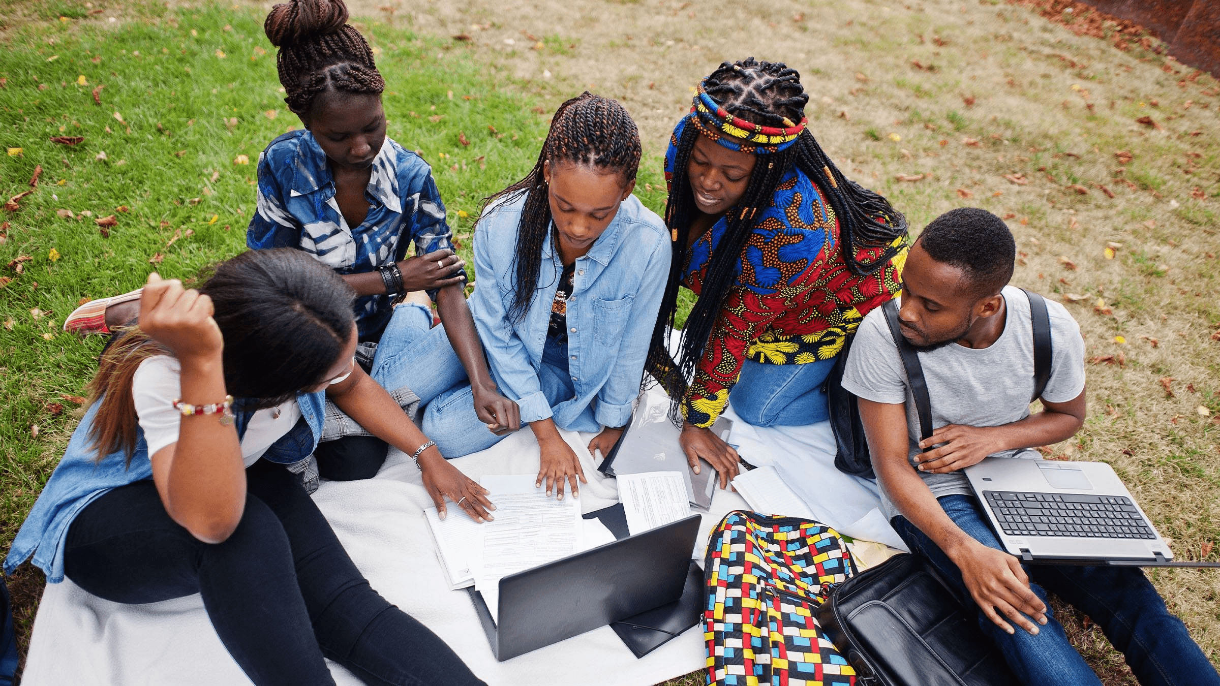 Learners working together on practical technology academy projects